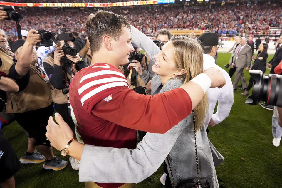 Brock Purdy hugs his fiancee, Jenna Brandt (Mark J. Terrill/AP)